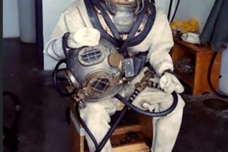 Spc. 5 Andrea Motley Crabtree in the Mark V deep sea dive suit at Fort Rucker, Ala., 1985. Crabtree, who was guest speaker at Fort Lee's Martin Luther King Observance Jan. 19, was the Army's first female deep sea diver. (photo courtesy of retired Master Sgt. Andrea Motley Crabtree).